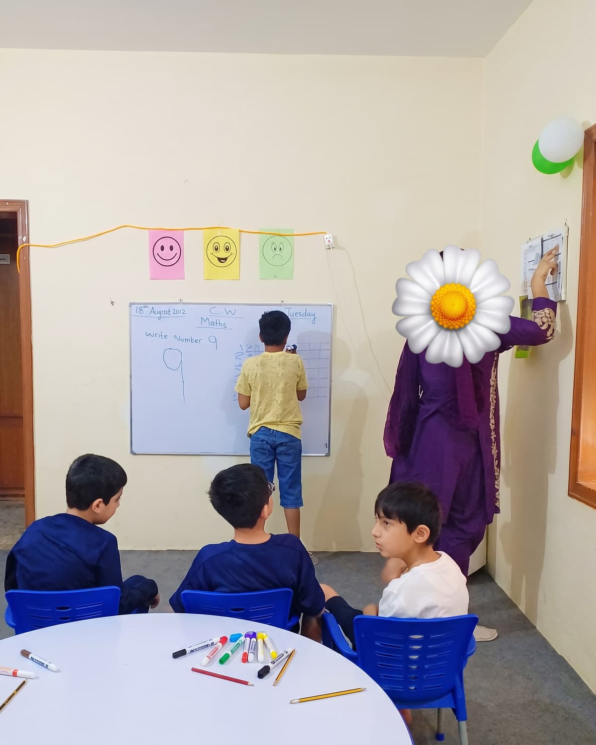 A classroom session with children at their desks